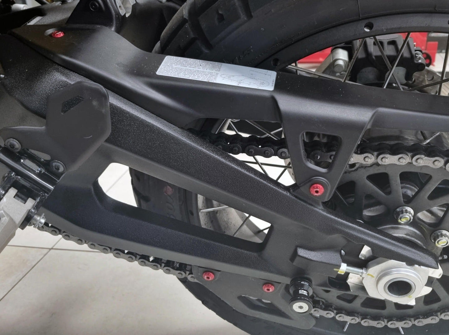 KV330 - CNC RACING Ducati DesertX (2022+) Chain Protection Screws (top and bottom) – Accessories in the Motoraider Motorcycle Aftermarket Accessories and Parts Online Shop