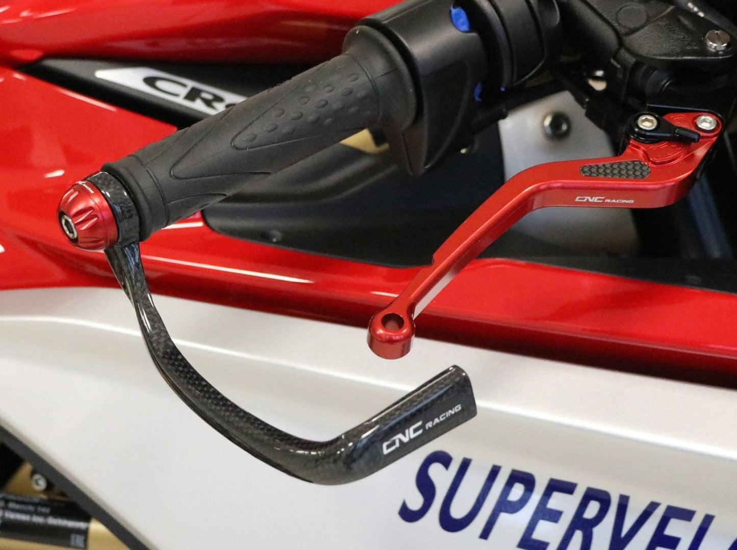 PL150 - CNC RACING Yamaha Carbon Racing Brake Lever Guard (including adapter) – Accessories in the Motoraider Motorcycle Aftermarket Accessories and Parts Online Shop