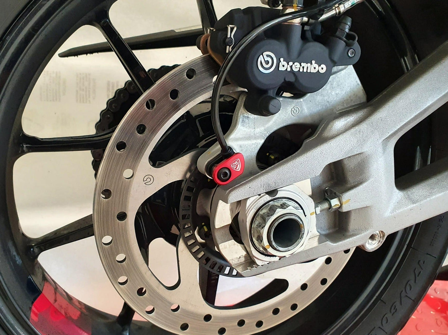PR201 - CNC RACING Ducati Steel ABS Sensor Protection – Accessories in the Motoraider Motorcycle Aftermarket Accessories and Parts Online Shop