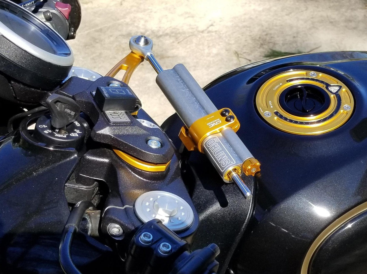 Ducati Scrambler Café Racer (17/21) OHLINS Steering Damper + CNC RACING Mounting Kit – Accessories in the Motoraider Motorcycle Aftermarket Accessories and Parts Online Shop