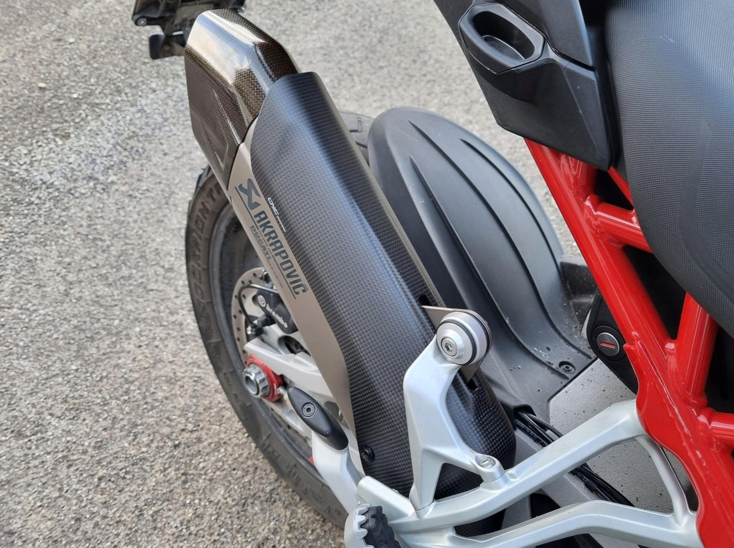 ZA998 - CNC RACING Ducati Multistrada V4 (2021+) Carbon Exhaust Silencer Heat Guard (for Akrapovic slip-on) – Accessories in the Motoraider Motorcycle Aftermarket Accessories and Parts Online Shop