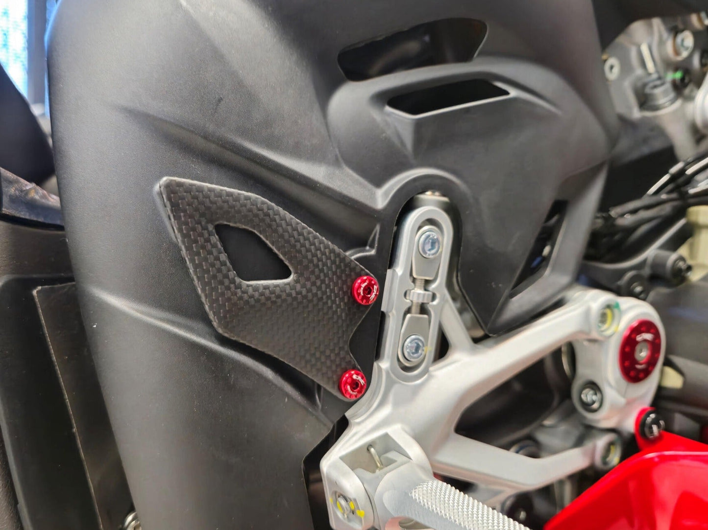 CNC RACING ZA412 Ducati Panigale V4 (2025+) Carbon Heel Guard Kit – Accessories in the Motoraider Motorcycle Aftermarket Accessories and Parts Online Shop