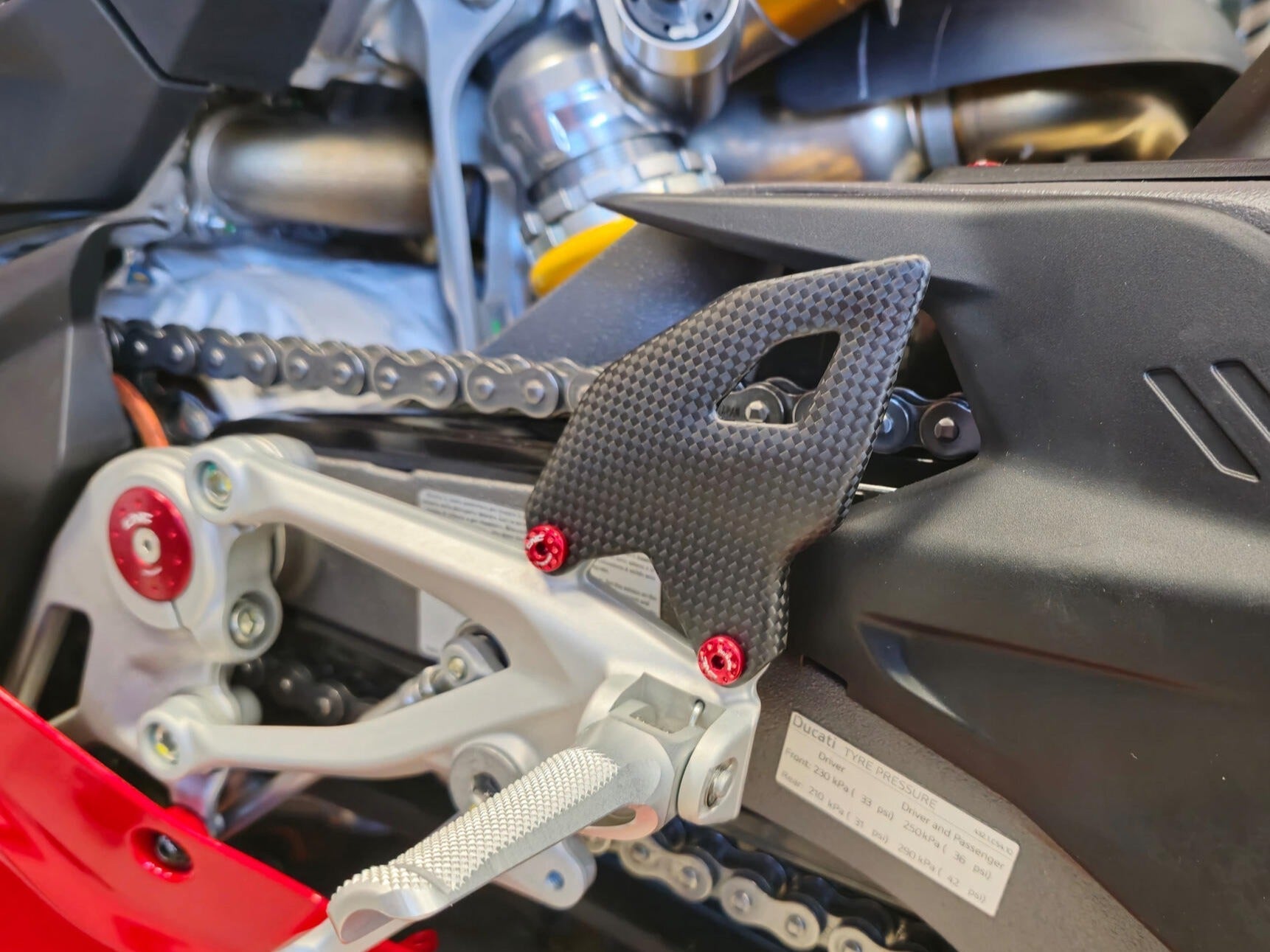 CNC RACING ZA412 Ducati Panigale V4 (2025+) Carbon Heel Guard Kit – Accessories in the Motoraider Motorcycle Aftermarket Accessories and Parts Online Shop