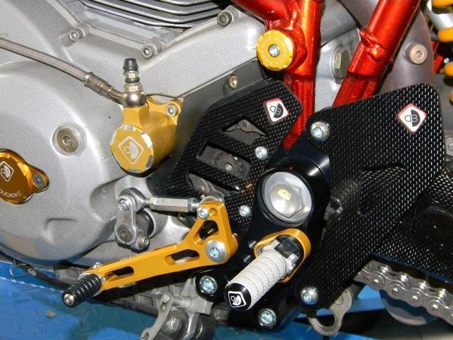 RPPC04 - DUCABIKE Ducati Multistrada / Hypermotard Carbon Pilot Heel Guards – Accessories in the Motoraider Motorcycle Aftermarket Accessories and Parts Online Shop